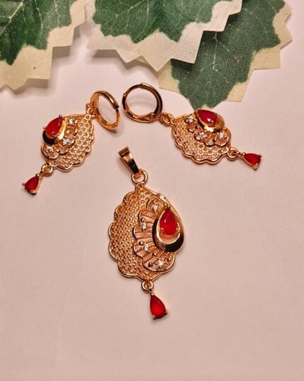 Mayura gold-plated festive pendant set with red teardrop stones