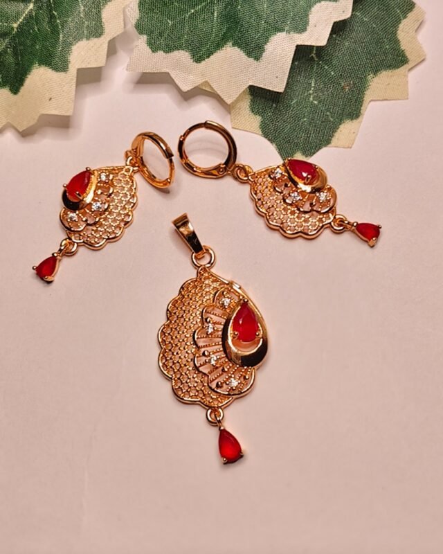 Mayura gold-plated festive pendant set with red teardrop stones
