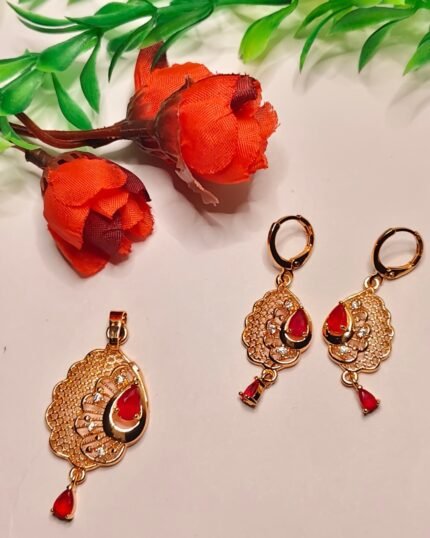 Mayura gold-plated festive pendant set with red teardrop stones