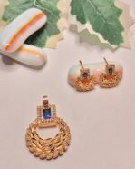 Athena gold-plated laurel wreath pendant set with royal blue stone and matching studs