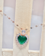 Esmeralda rose gold heart pendant with a starburst halo