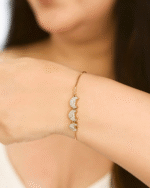model wearing Gold Plated Pave Crescent Bolo Bracelet, Tarnish Free Adjustable Slider Bracelet